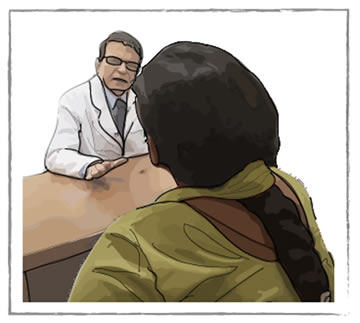 Picture of Seema talking to her doctor